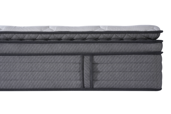 Gray mattress with a textured surface on a white background